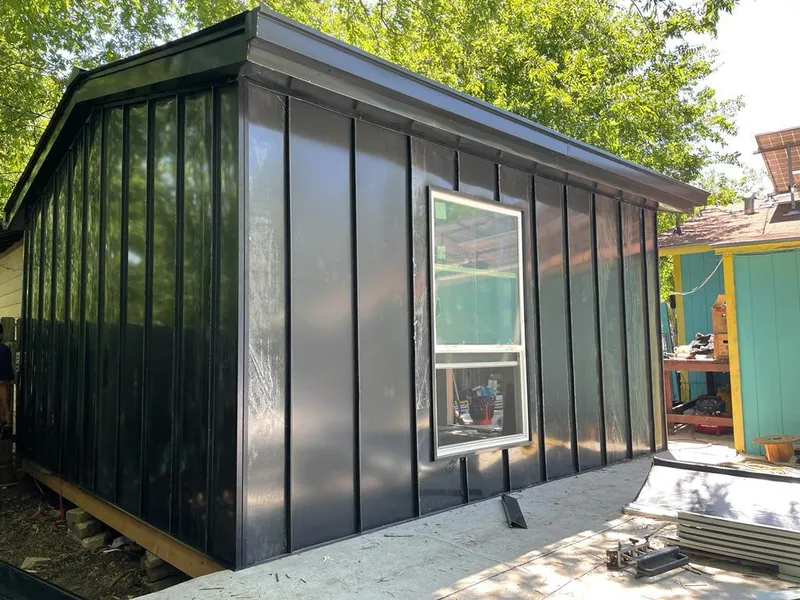 Black standing seam metal wall panels for Roof Inspection in Timberwood Park